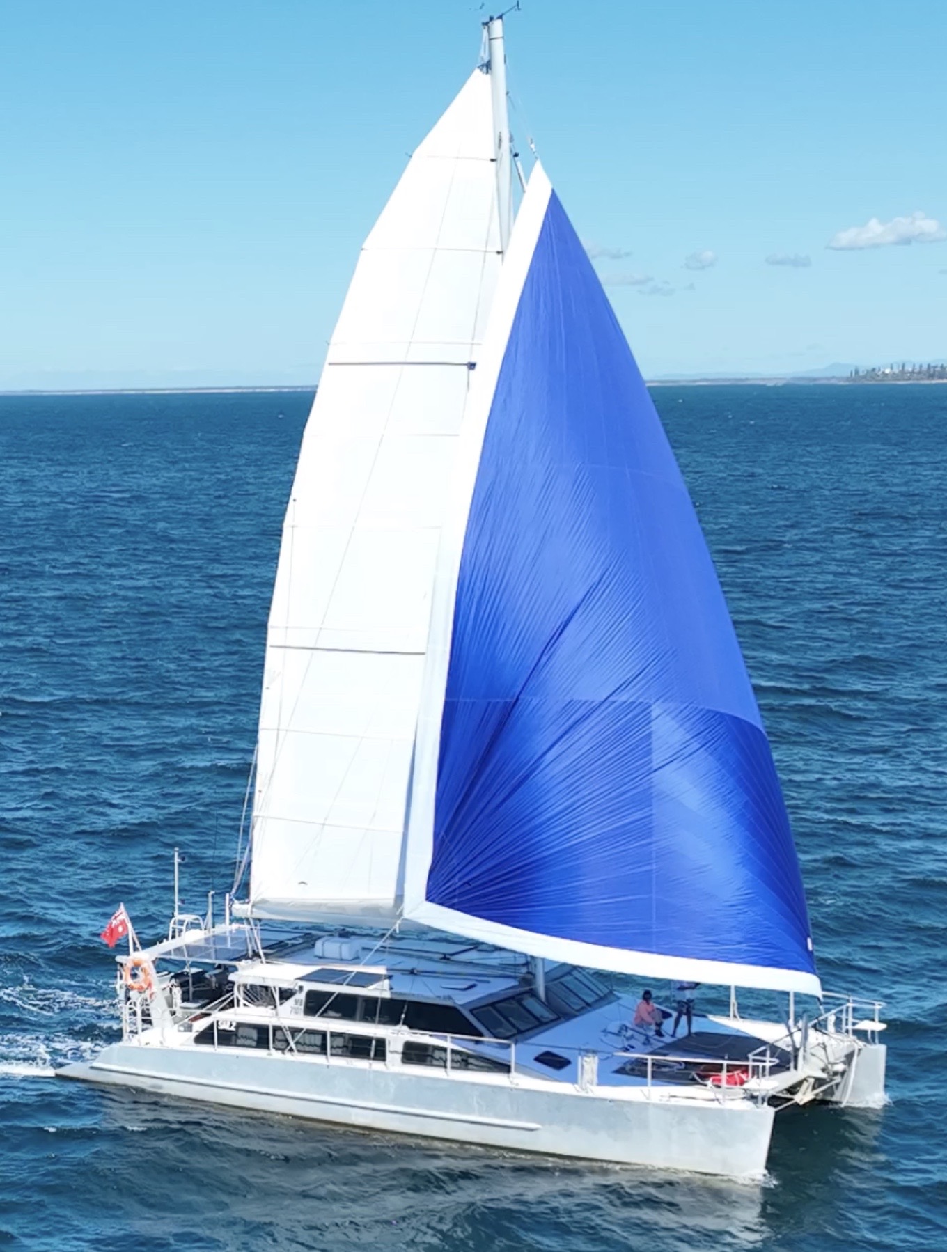 SAIL2 sailing beneath its blue sail